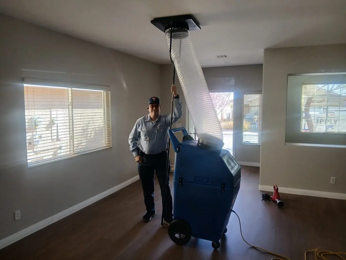 Professional Dryer Vent Cleaning work inside a Piqua home